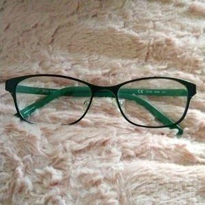 Juicy Couture black and turquoise frame.